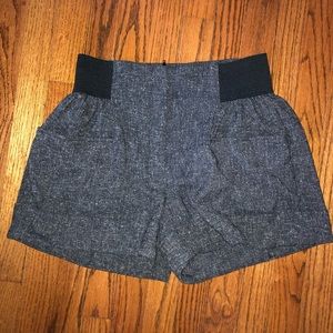 Small gray and black zip up shorts